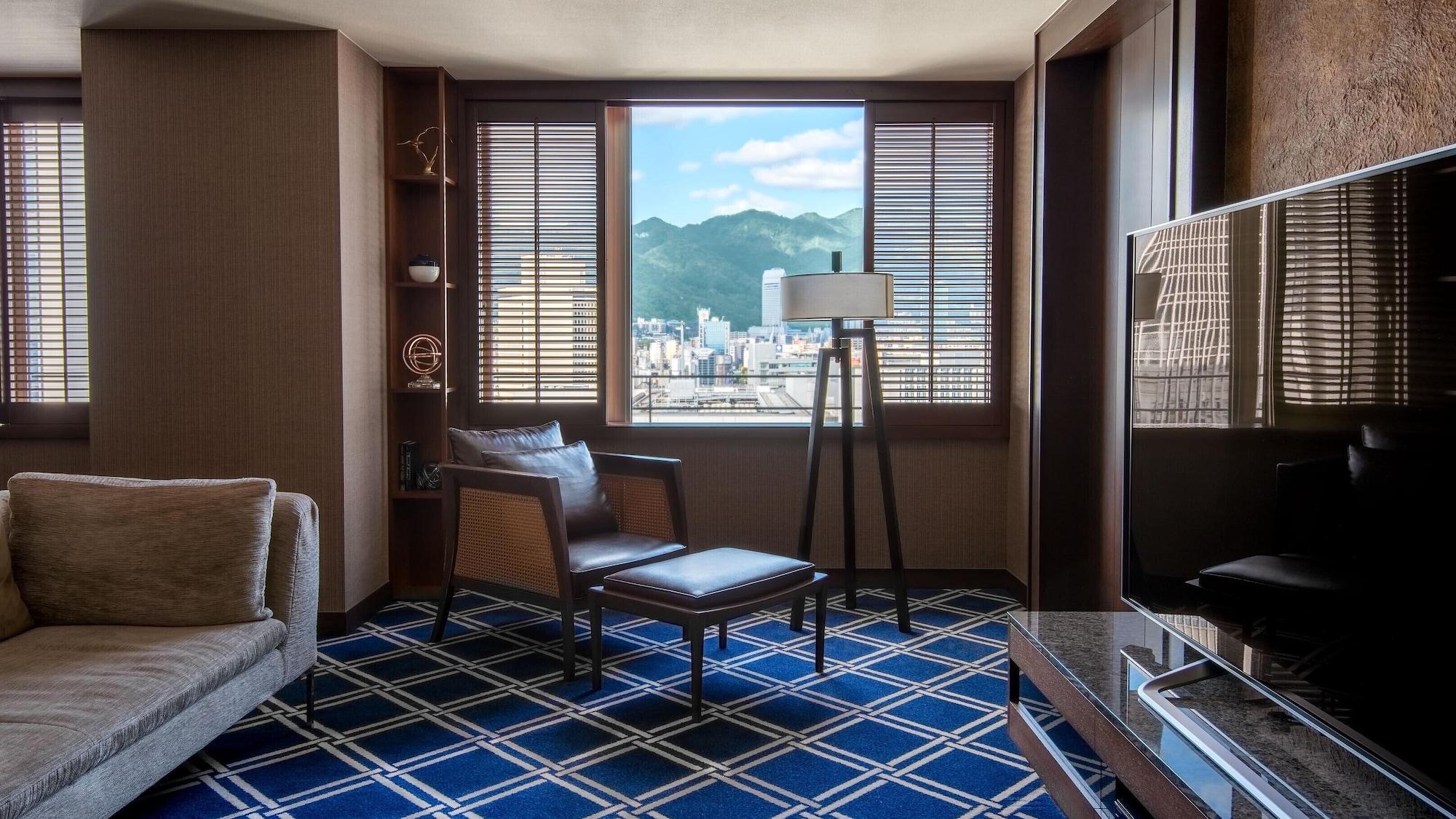 فندق أورينتال كوبه المظهر الخارجي الصورة A room at the hotel